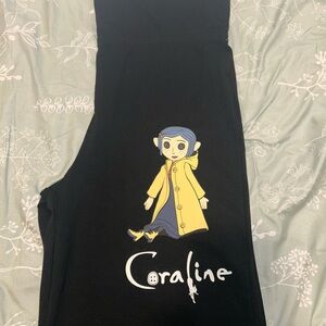 Coraline Black Leggings with Yellow Coat Design